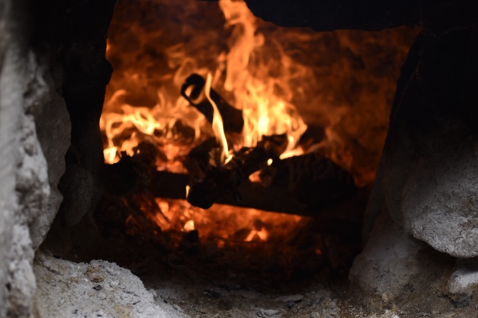 Inside the first distillery - a fire surrounded by stones